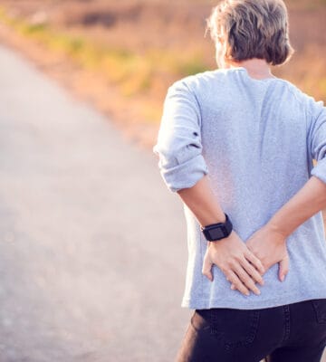 Woman suffering from hip pain.